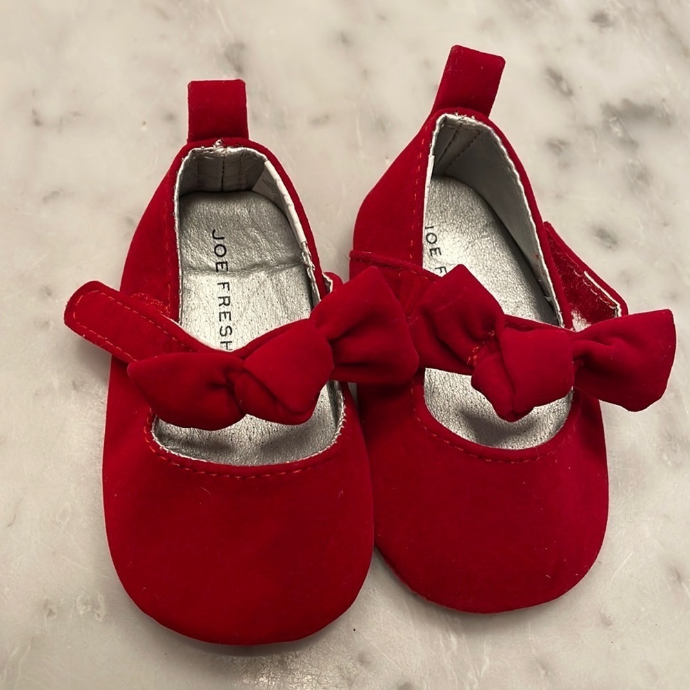 Red baby slippers